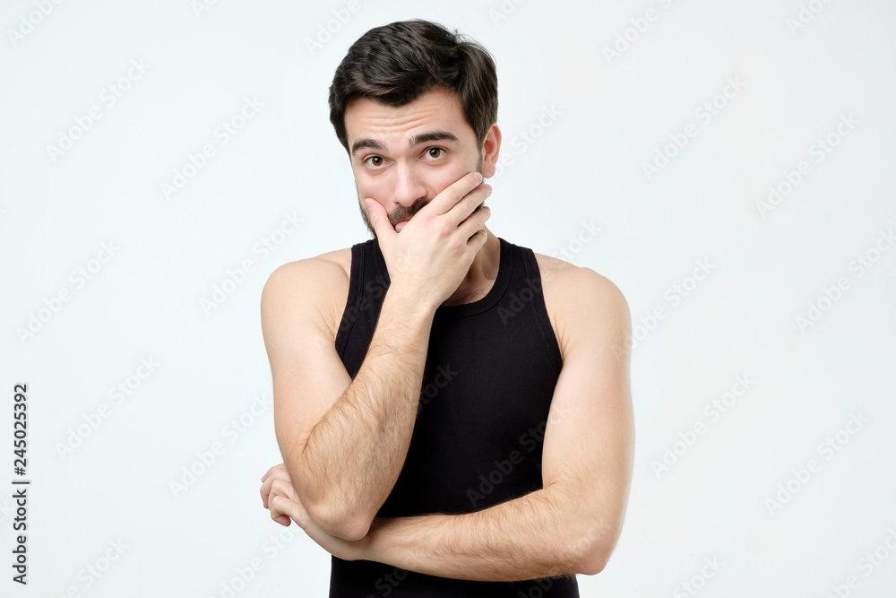 Hispanic man thinking expressing doubts and concerns. Negative face expression Hispanic man thinking expressing doubts and concerns. Negative face expression