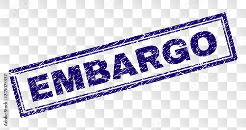 EMBARGO stamp seal print with rubber print style and double framed rectangle shape. Stamp is placed on a transparent background. Blue vector rubber print of EMBARGO title with retro texture.