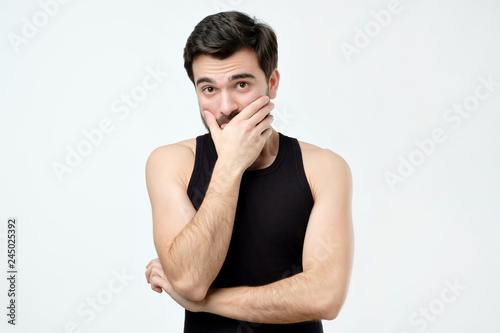 Hispanic man thinking expressing doubts and concerns. Negative face expression