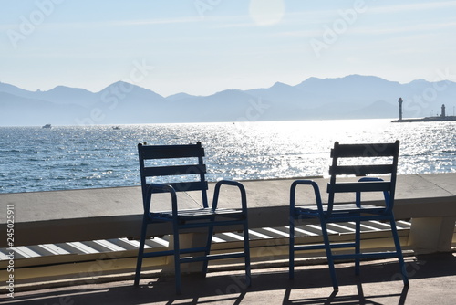 chairs at sunset