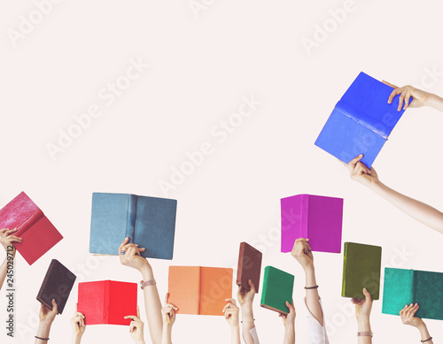 Hands holding different books on isolated background