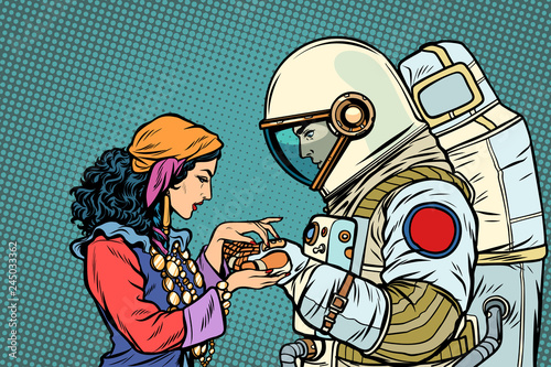 The fortune teller, and an astronaut. Palmistry by hand