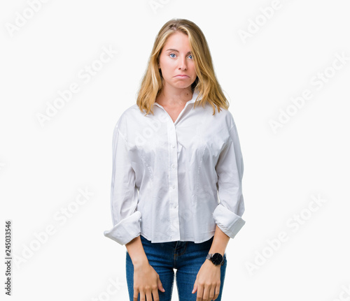 Beautiful young business woman over isolated background depressed and worry for distress, crying angry and afraid. Sad expression.