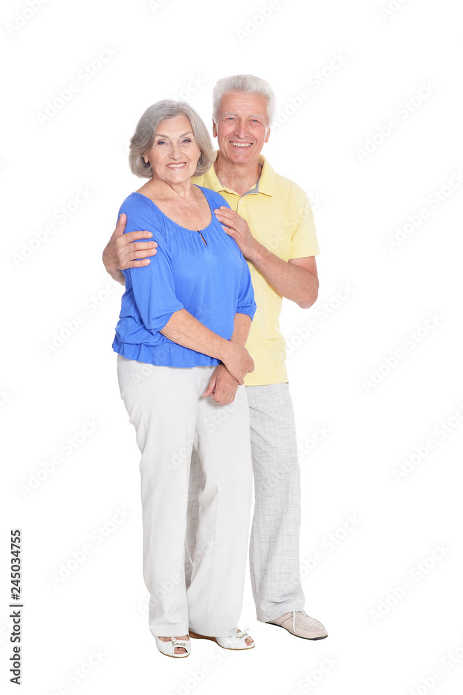 Happy senior couple posing on white background Happy senior couple posing on white background