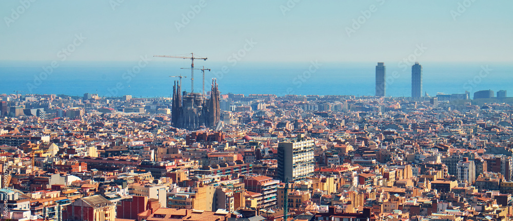 Panorama view of Barcelona from a hill at the park Guel