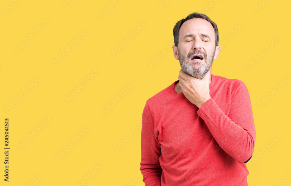 Handsome middle age hoary senior man wearing winter sweater over isolated background Touching painful neck, sore throat for flu, clod and infection Handsome middle age hoary senior man wearing winter sweater over isolated background Touching painful neck, sore throat for flu, clod and infection