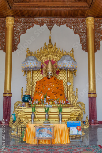 Buddha statue at Botataung Paya pagoda in Yangon, Maynmar photo