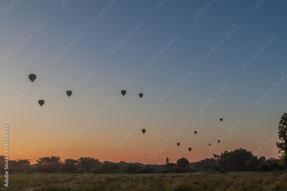 Silhouettes of hot air balloons in Bagan, Myanmar Silhouettes of hot air balloons in Bagan, Myanmar