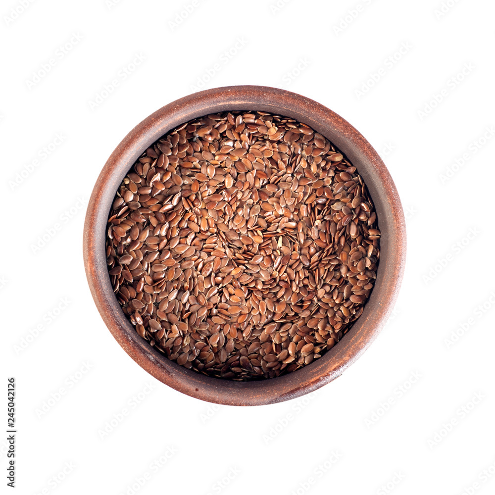 flax seeds, round ceramic cup, top view, isolated on white background flax seeds, round ceramic cup, top view, isolated on white background