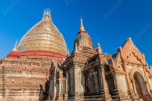 Dhammayazika Pagoda in Bagan, Myanmar. Pagoda is under a scaffolding because of repairs after the earthquake of 2016. © Matyas Rehak