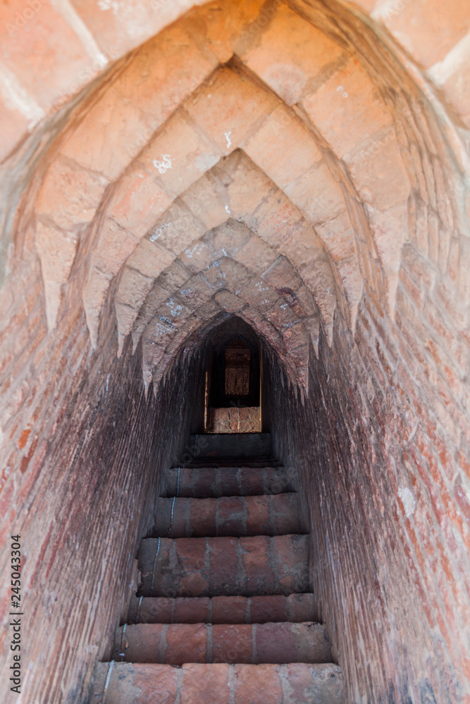 Fototapeta premium Narrow steep stairway in Pyathada Paya temple in Bagan, Myanmar