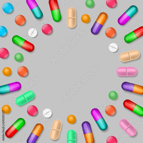 Background with colored tablets and pills