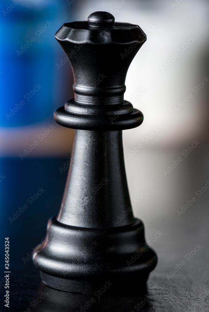chess black queen closeup on a blurred background chess black queen closeup on a blurred background