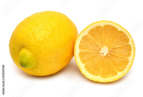 Lemon creative whole and half isolated on white background. Yellow fruit. Flat lay, top view
