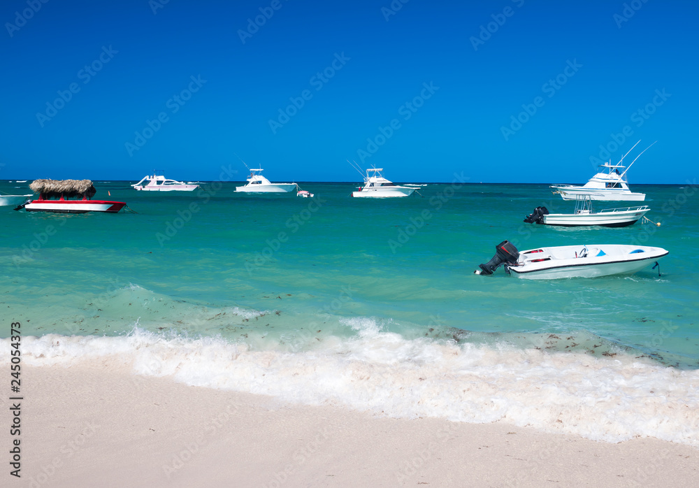 Caribbean destinations with boats in the sea