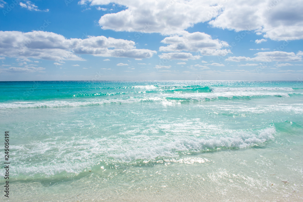 Waves on Caribbean sea. Crystal clear water, Playa Delfines, Cancun, Mexico Waves on Caribbean sea. Crystal clear water, Playa Delfines, Cancun, Mexico