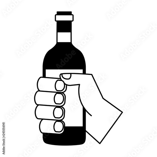 hand holding wine bottle