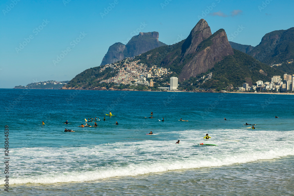 Rio de Janeiro city / Brazil South America - 08/29/2018: Surfers waiting for the perfect wave. Wonderful places in the world for surfing. 