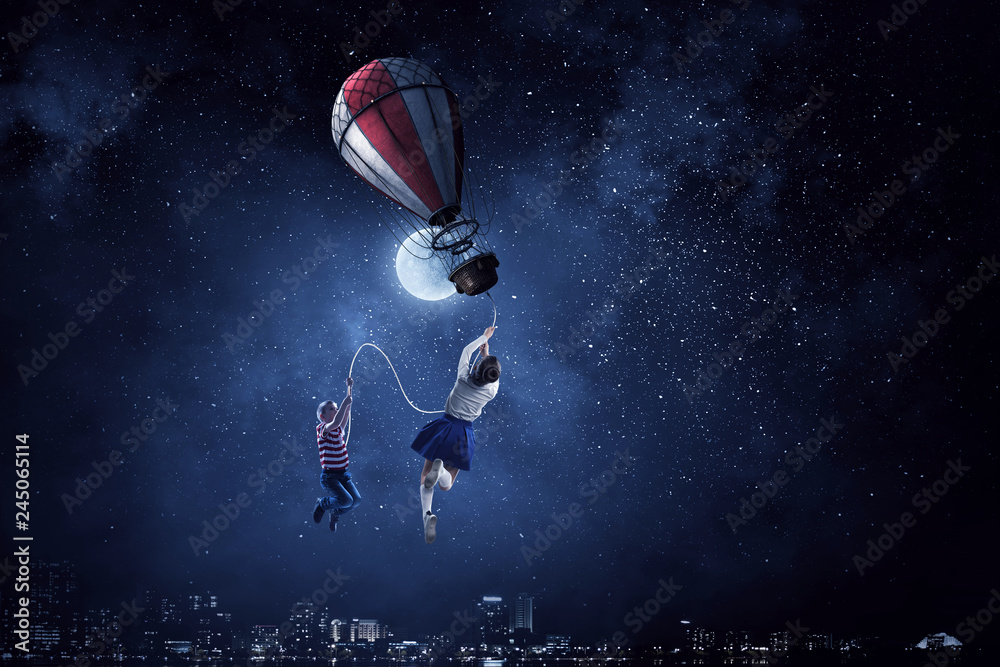 Naklejka premium Girl fly in sky. Mixed media
