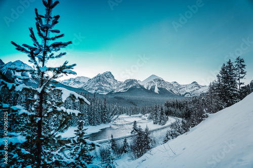 Morant's Curve with train in winter, Banff National Park, AB, Canada © Max