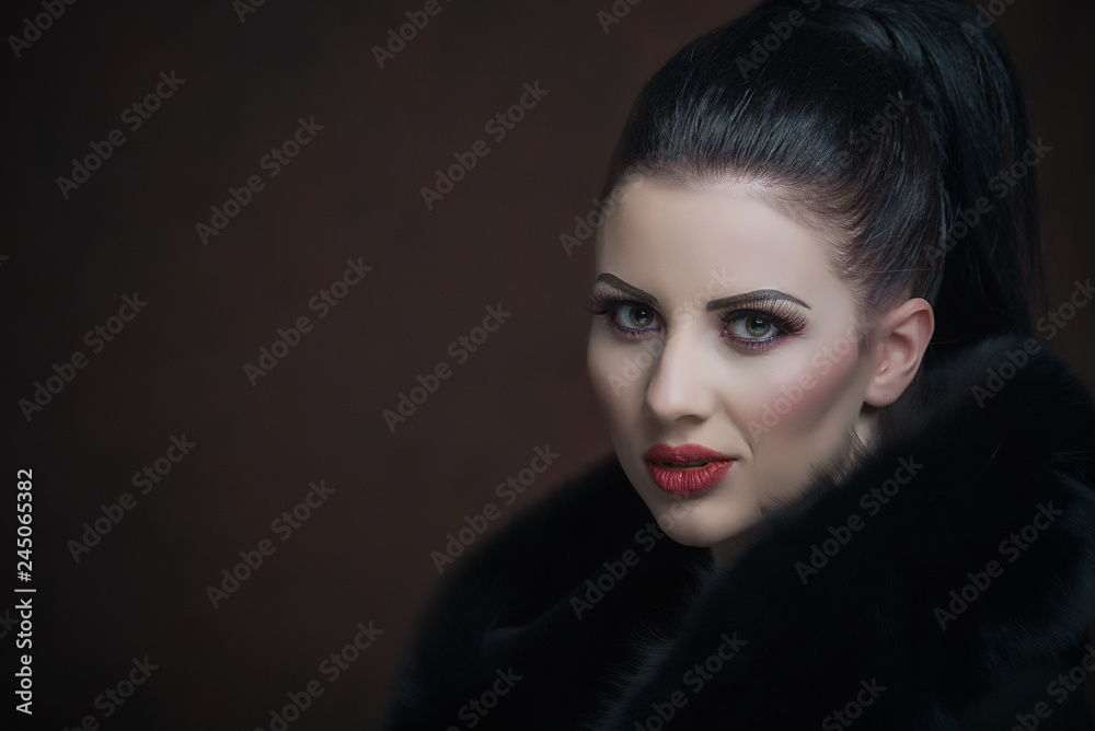 Fototapeta premium Girl with a black fur