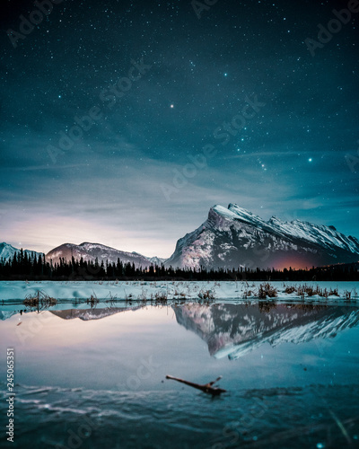 Beautiful night full of stars above Mt Rundle, Vermilion Lakes and Banff town, Banff National Park, Canadian Rockies, Rocky Mountains, Travel Alberta, Canada, North America photo