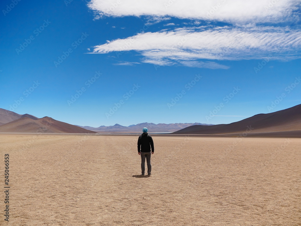 Tourist in the high altitude desert, Bolivia