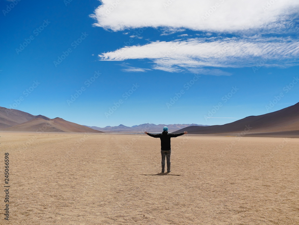 Tourist in the high altitude desert, Bolivia