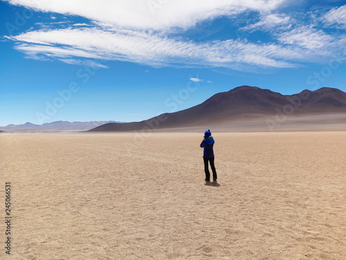 Tourist in the high altitude desert  Bolivia