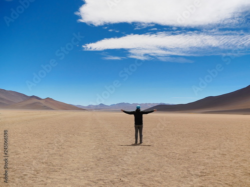 Tourist in the high altitude desert, Bolivia