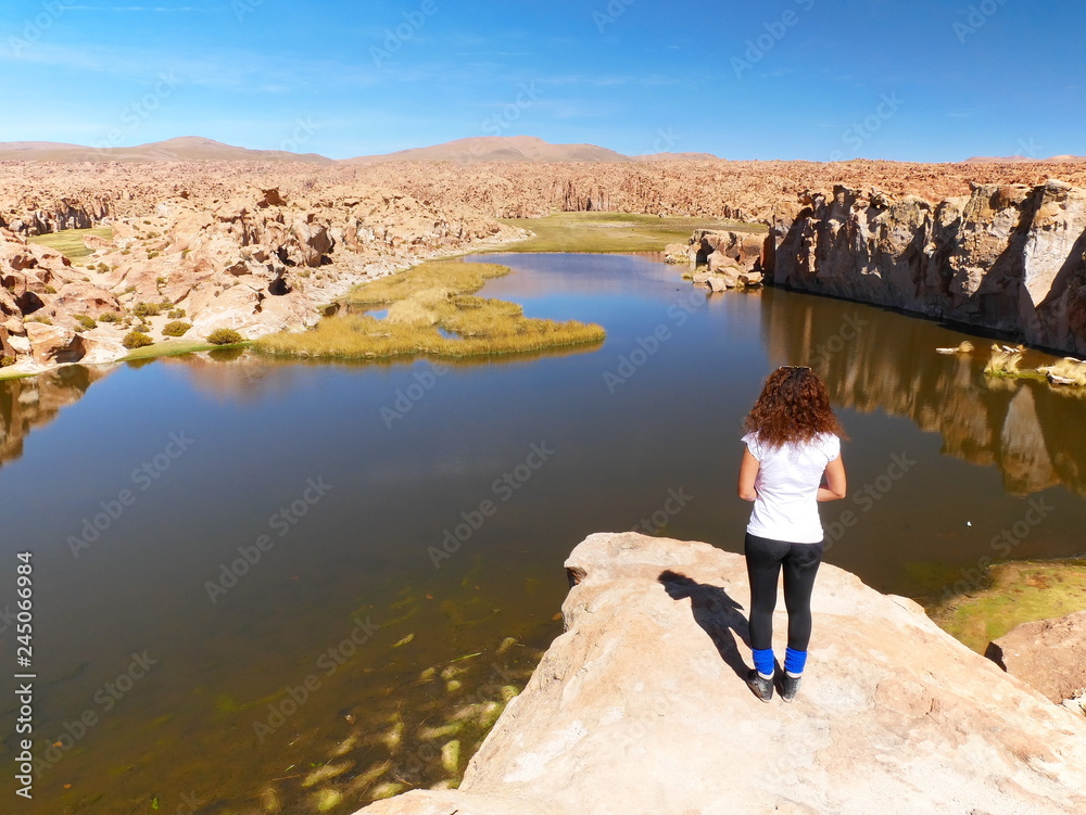 Tourist at Laguna escondida in Sur Lipez, Bolivia