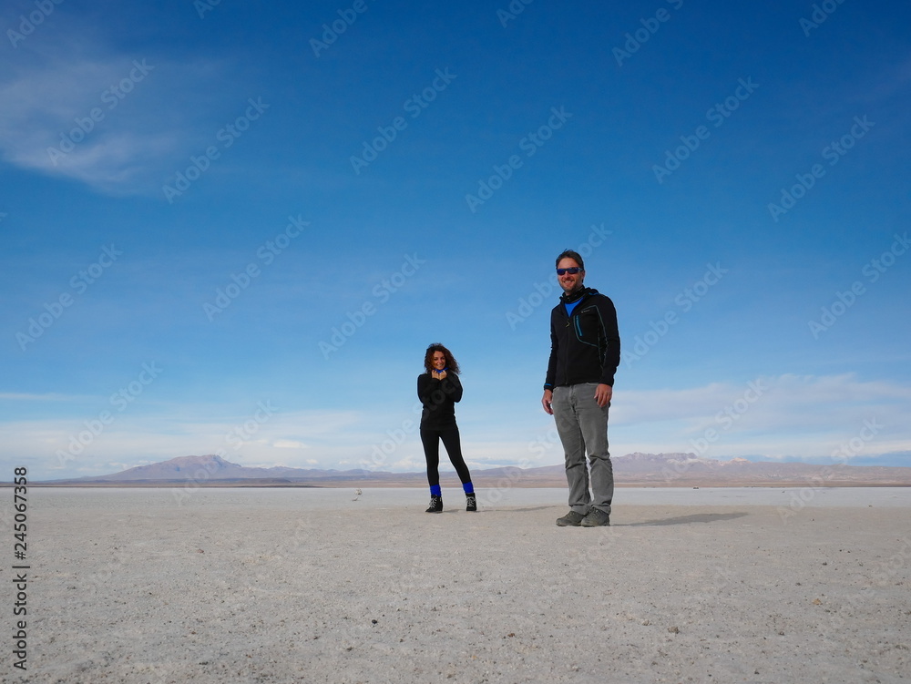 Young tourist at Salar de Uyuni, Bolivia Young tourist at Salar de Uyuni, Bolivia