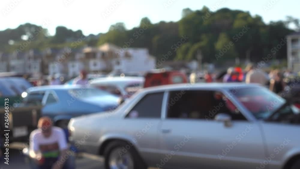 Blurred Carshow At Beach With Lots Of People Blurred Carshow At Beach With Lots Of People