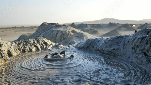 Close up shot of the mud exploding from the earth at the Mud Volcanoes in Baku, Azerbaijan photo