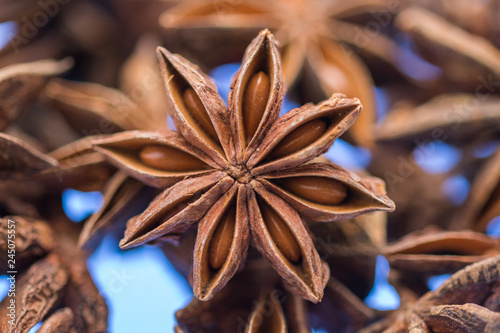  Dried anise on blue background