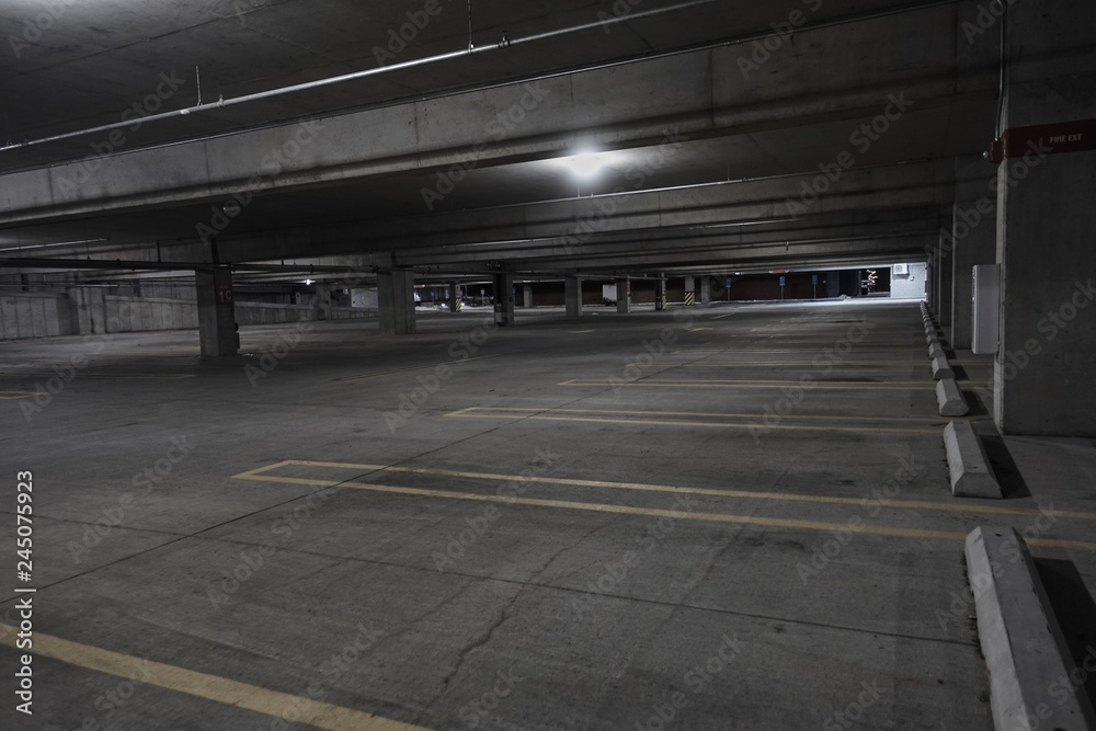 empty car parking ramp at night empty car parking ramp at night