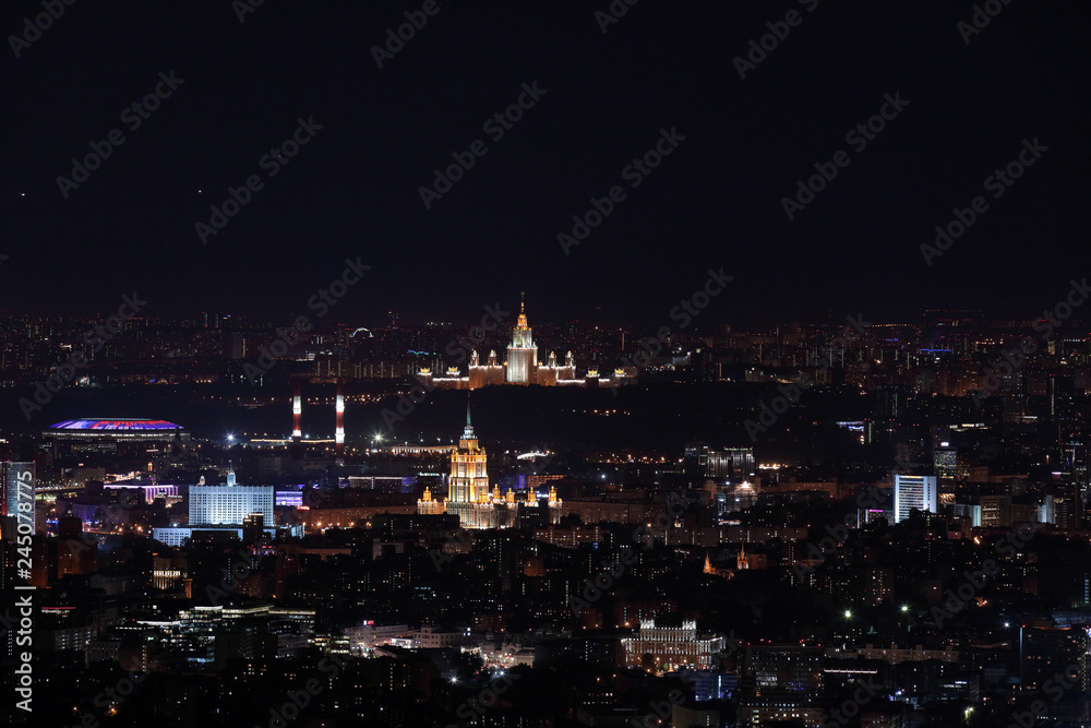 Night panorama of Moscow from Ostankinskaya tv tower with Moscow State University, Hotel Ukraine, White House, and Luzhniki stadium