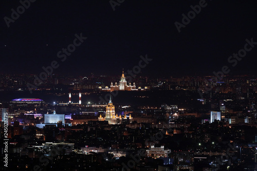 Night panorama of Moscow from Ostankinskaya tv tower with Moscow State University, Hotel Ukraine, White House, and Luzhniki stadium