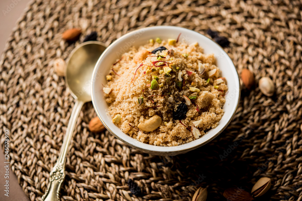 Semolina Halwa / Sooji ka Halva or sweet Rava Sheera or shira - Indian festival sweet made of semolina, nuts and Ghee Semolina Halwa / Sooji ka Halva or sweet Rava Sheera or shira - Indian festival sweet made of semolina, nuts and Ghee