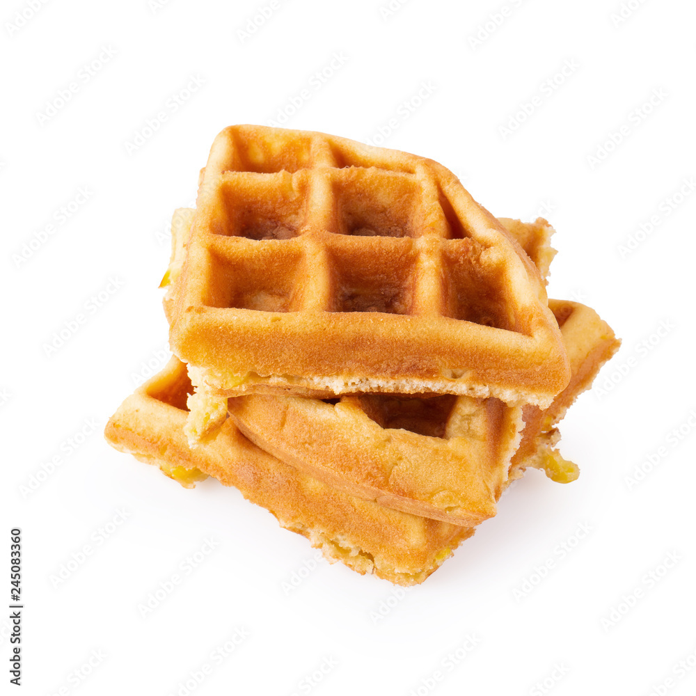 Freshly baked waffles isolated over white background. Freshly baked waffles isolated over white background.