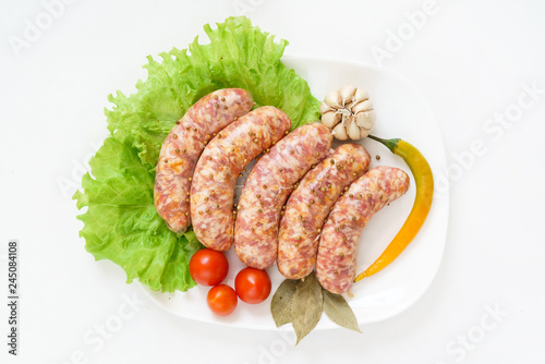raw sausages with garlic and hot pepper