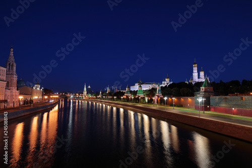 Night view of a Moscow Kremlin. Cathedral of Christ the Saviour, Kremlin wall towers, Cathedral of Annunciation, Cathedral of Archangel and Ivan the Great Bell-Tower from Bolshoy Moskvoretskiy most