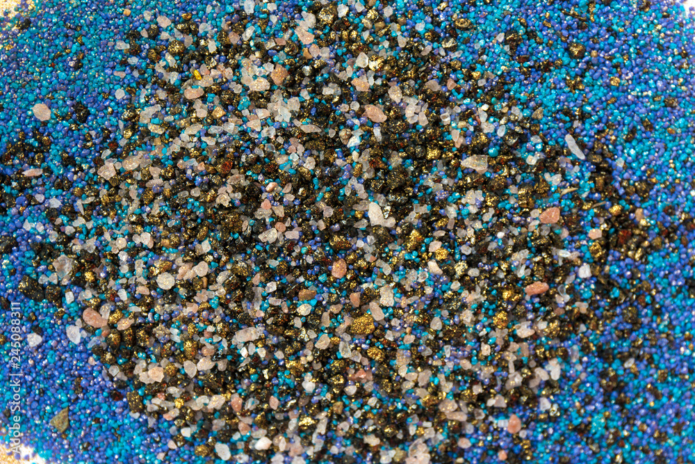 Layered colorful sand pattern. Marble style background. Blue and gold powder texture. Layered colorful sand pattern. Marble style background. Blue and gold powder texture.