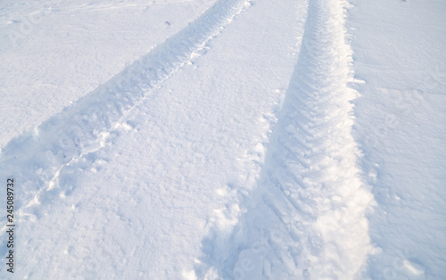 car tracks in the snow