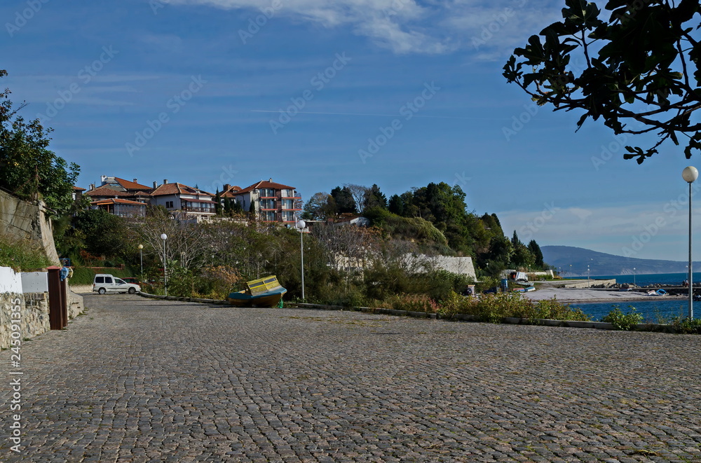 Seascape  of residential district with antique  houses and small beach in ancient city Nessebar or Mesembria on the Black Sea coast, Bulgaria, Europe  