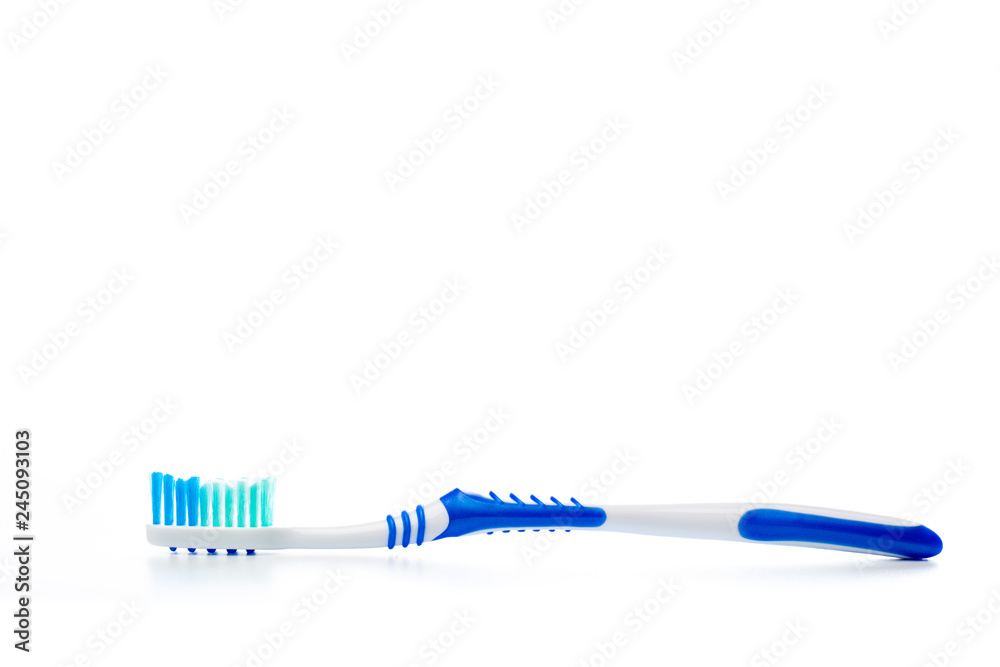 colored toothbrush on an isolated background, close up colored toothbrush on an isolated background, close up