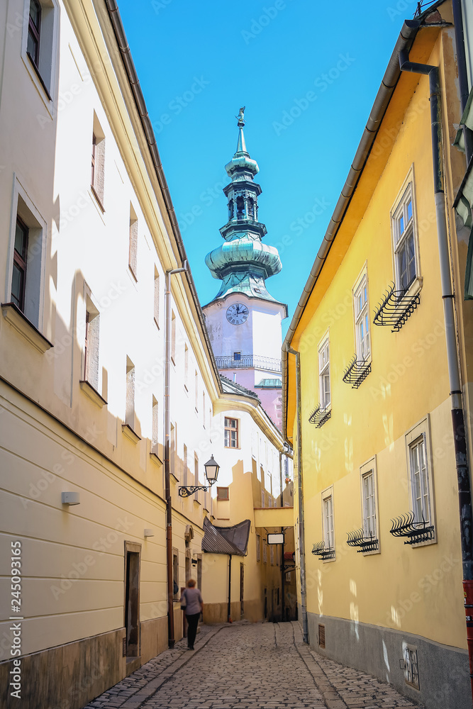 narrow cobbled street leading to the temple in the Slovak city of Bratislava