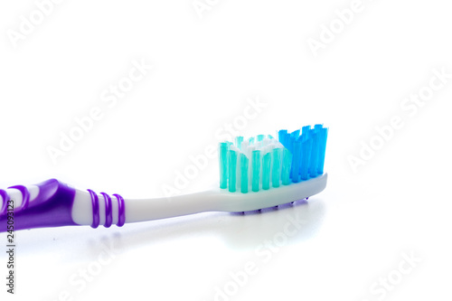 colored toothbrush on an isolated background  close up