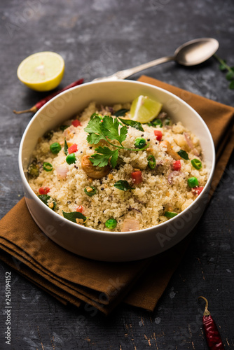 Rava Upma / Uppuma - south indian breakfast served in a bowl. selective focus