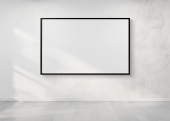 Black frame hanging on a wall mockup 3d rendering
